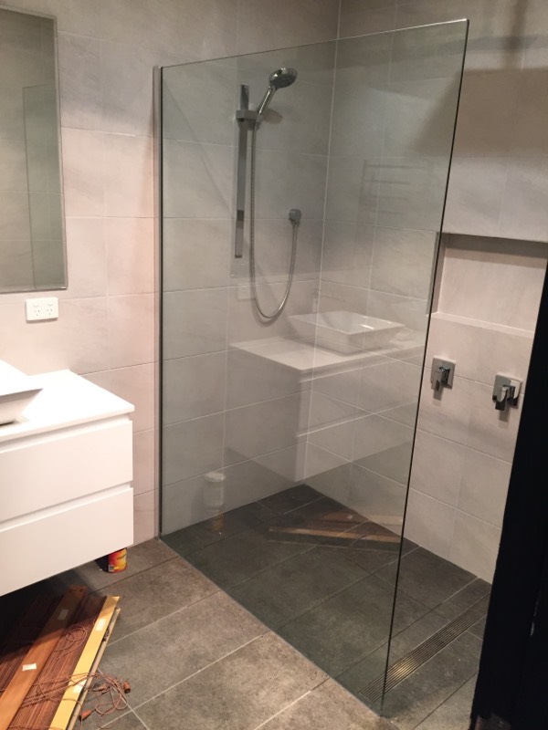 fixed frameless glass shower screen